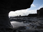 SX08617 Silhouettes of Matt, Jenni and Lib underneath rock.jpg